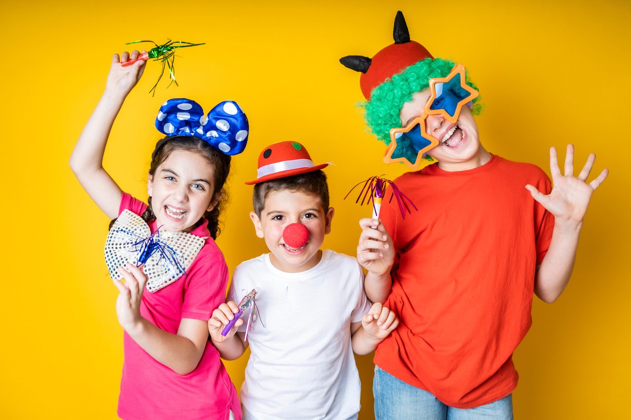 Group of Children Wearing Photo Booth Props 